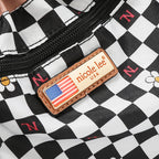 Bolsa media luna Nicole Lee acabado brillante y llavero FW25