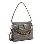 Bolsa satchel Nicole Lee acabado brillante y llavero FW25
